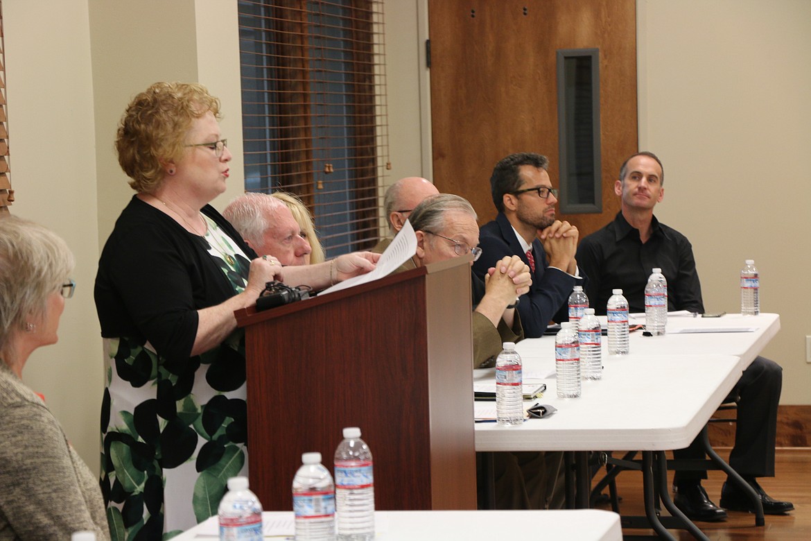 (Photo by CAROLINE LOBSINGER)
Kate McAlister, president and CEO of the Greater Sandpoint Chamber of Commerce, talks at Wednesday's gathering to take a stand against a rash of hate propoganda in the community.