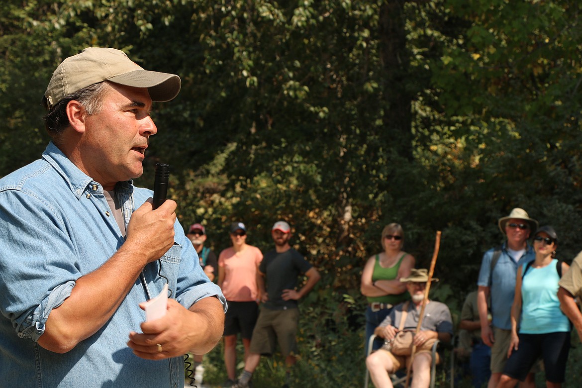 (Photo by CAROLINE LOBSINGER)Mick Schanilec of the Idaho Department of Lands talks about the Sundance and Trapper Creek fires during a commemoration of the fire's 50th anniversary on Saturday in the Pack River drainage. The ceremony was held near the heart of where the fire took place.