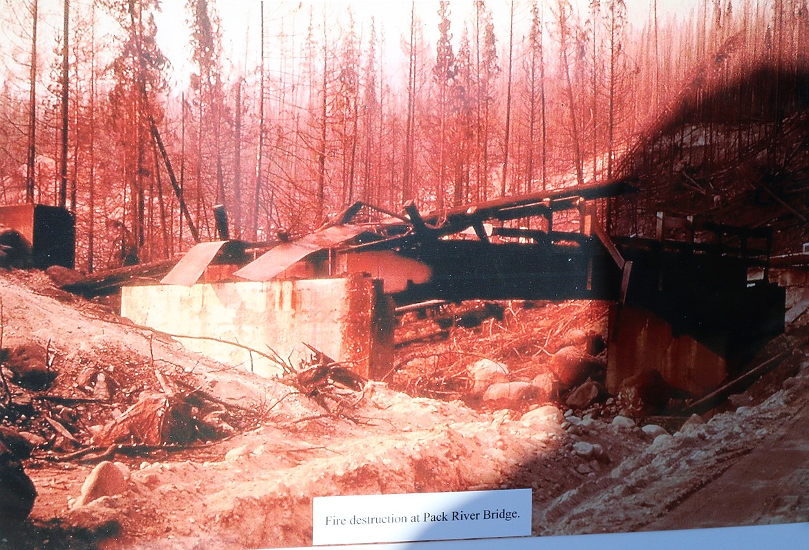 (Photo by CAROLINE LOBSINGER)A photo of a picture at the Sundance Fire 50th anniversary commemoration. The photograph shows the destruction to the Pack River Bridge caused by the Sundance Fire.