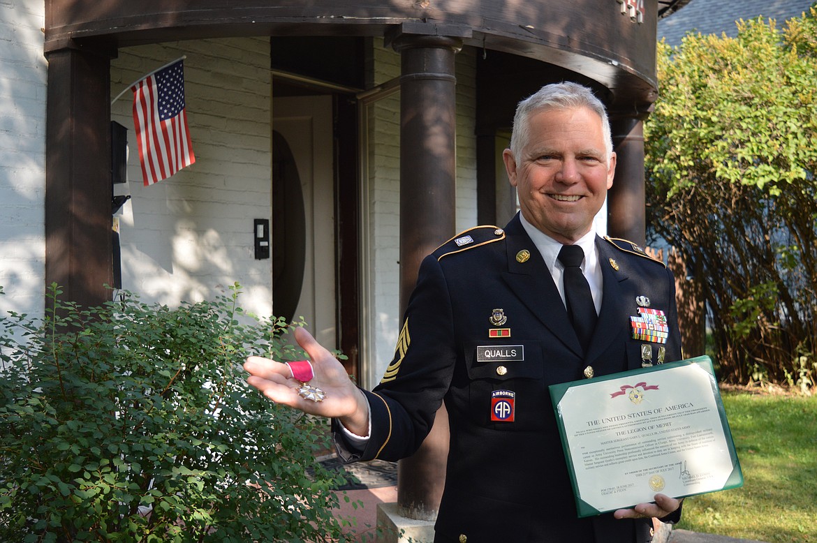 Master Sgt. Gary Qualls, an Army journalist from Kalispell, with his Legion of Merit medal and award. (Mary Cloud Taylor photos/Daily Inter Lake)