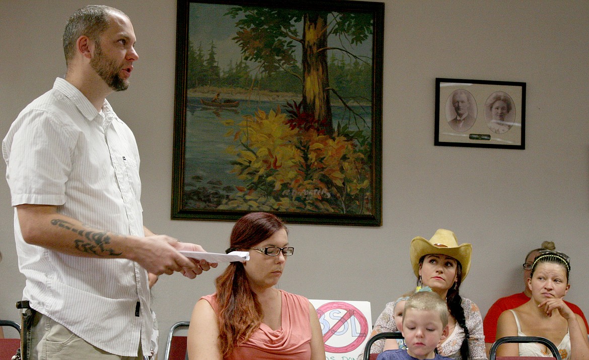 Chris Johnson, left, address the Libby City Council Ordinance Committee regarding breed specific legislation Thursday, Aug. 31. (Elka Wood/The Western News)