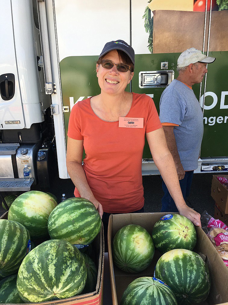 Courtesy photo
Volunteers sorted and distributed food to more than 200 families at the Aug. 31 food distribution in Quincy, sponsored by the Microsoft data center in Quincy and 2nd Harvest, Spokane.