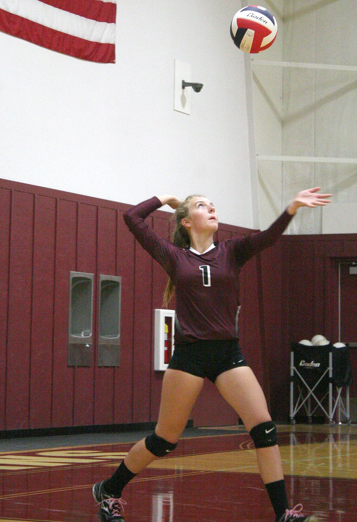 Annie Day serves in the third of three games against Deer Lodge on Friday. (Elka Wood/The Western News)