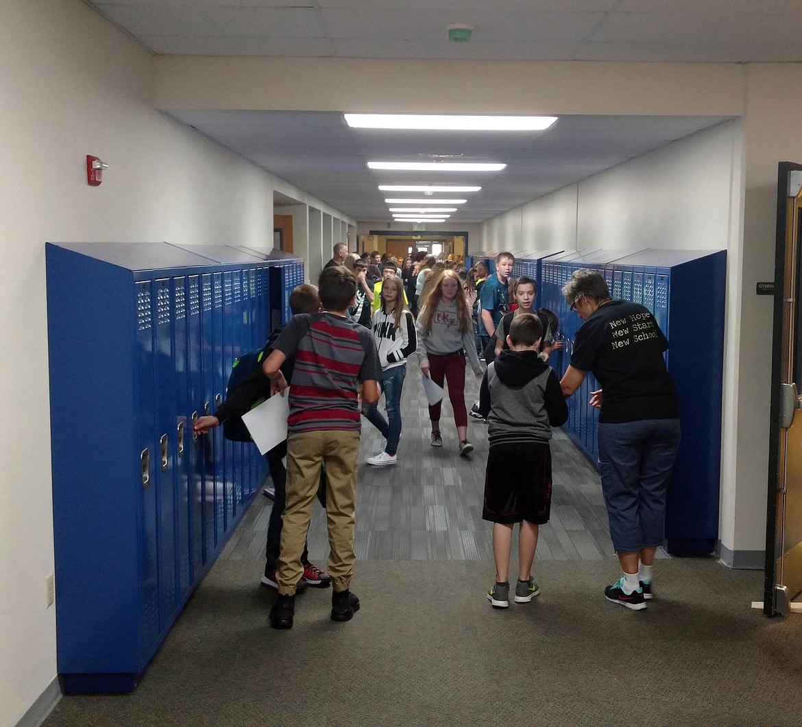 Photo by Josh McDonald
Students get used to their new lockers in the hallways of Kellogg Middle School on the first day of school.