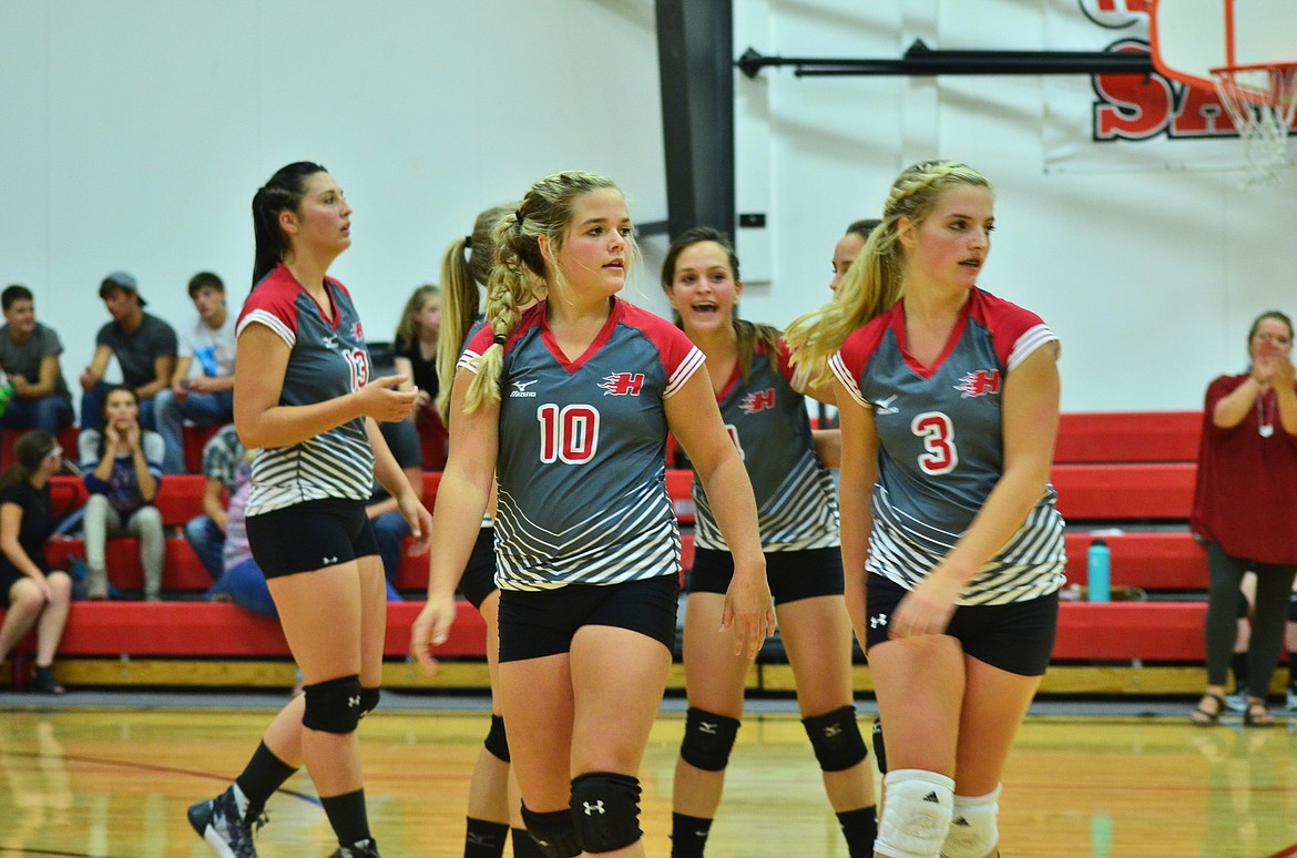 A happy on court team as they score yet again during the third quarter. (Erin Jusseaume/Clark Fork Valley Press)