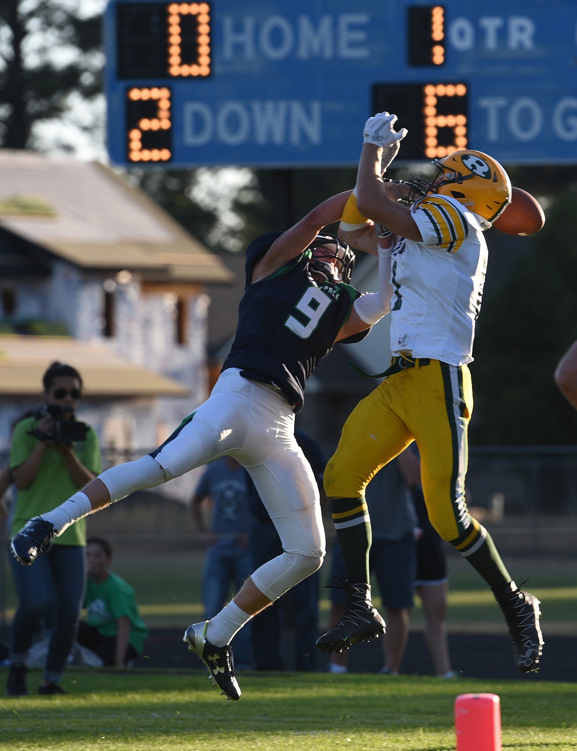 Glacier defensive back Caden Harkins breaks up a pass in the end zone during the first quarter against C.M. Russell on Friday. (Aaric Bryan/Daily Inter Lake)