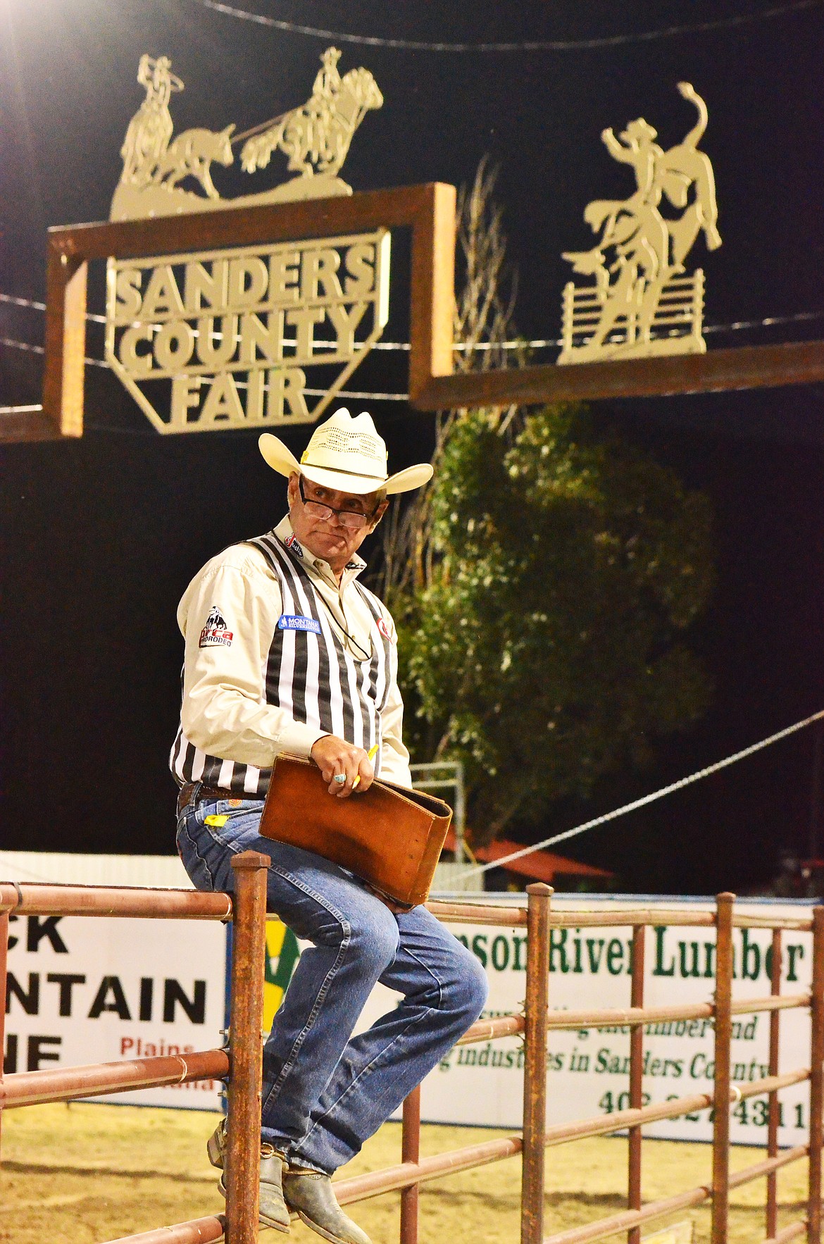 PRCA Arena Judge Gordon Kesler waiting for the arena to clear of the bucking bulls as he marked/scored all the competitors here at the 2017 rodeo. (Erin Jusseaume/Clark Fork Valley Press)