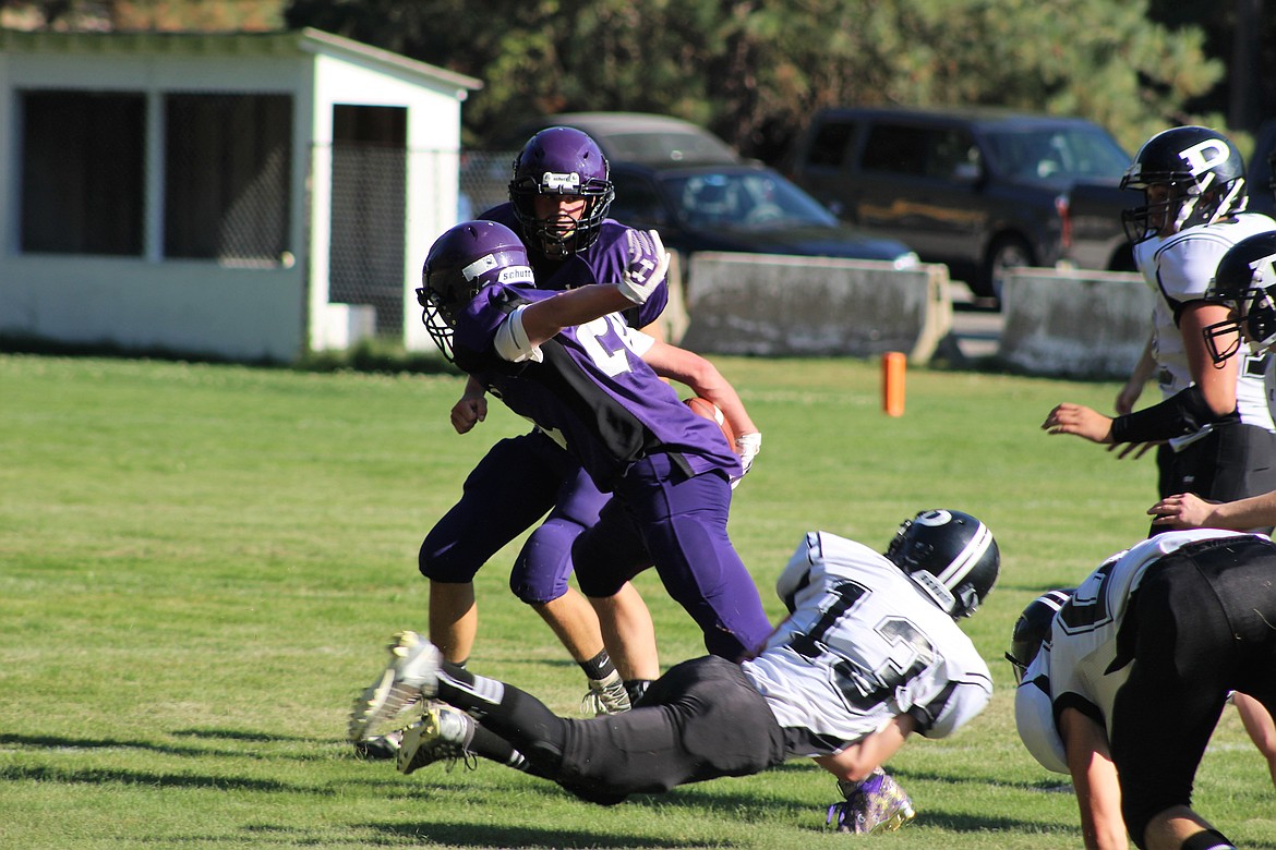 Riley Trogden shakes off a Deary defender to score Mullan&#146;s first touchdown.