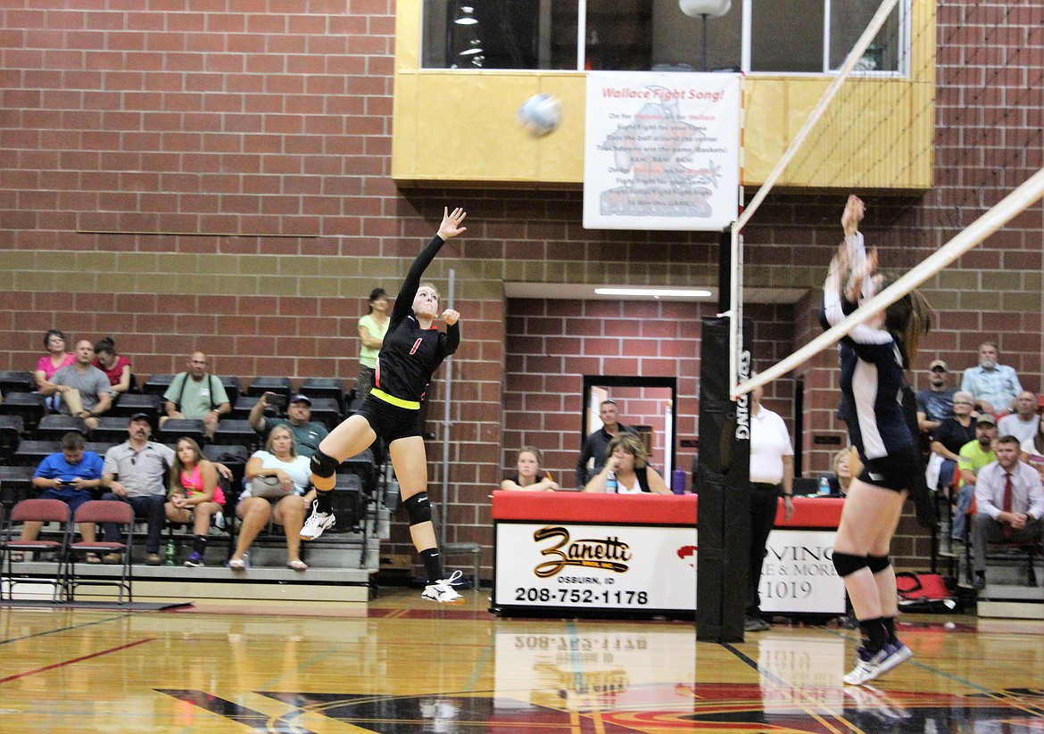 Photo by Chanse Watson
Miner Catie Sheppard kills the ball during Wallace&#146;s match with CDA Charter last week.