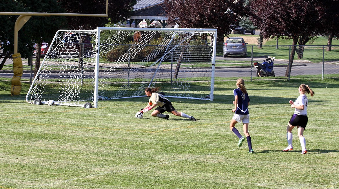 Photo by Josh McDonald
Kellogg goalie Shea Curran makes a diving save during the Wildcats match against Timberlake.