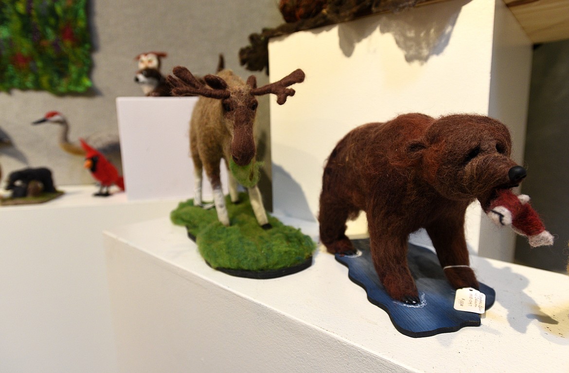 Felted animals created by Jill Spady sit on a shelf at the Bigfork Art and Cultural Center for the Uncommon Threads exhibit. (Aaric Bryan/Daily Inter Lake)