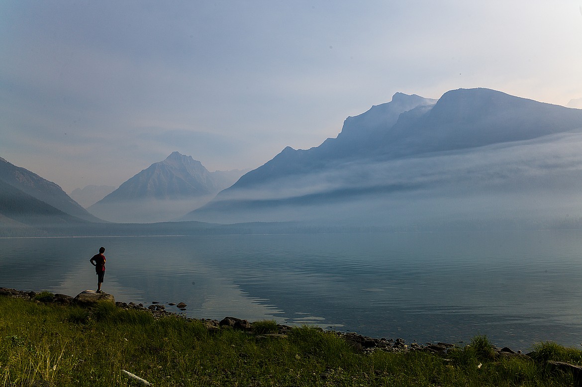 Smoke from the Sprague Fire hangs over Lake McDonald Saturday morning.