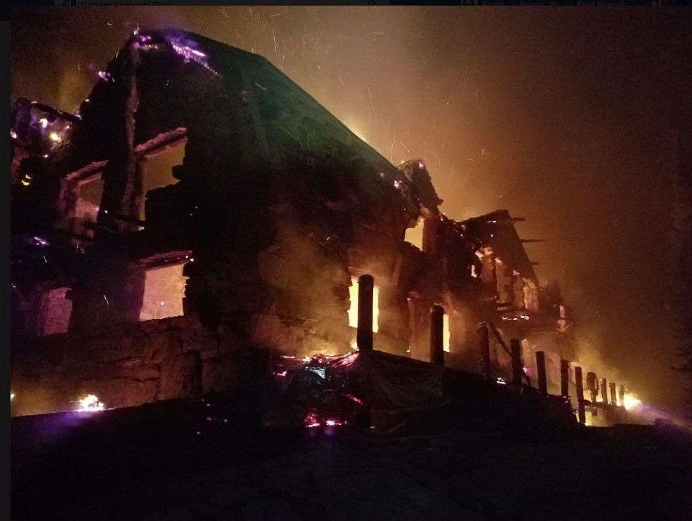 The main Sperry Chalet building was quickly engulfed in flames and burned into the night on Thursday. Firefighters continue to protect the surrounding structures. (Glacier National Park photo)