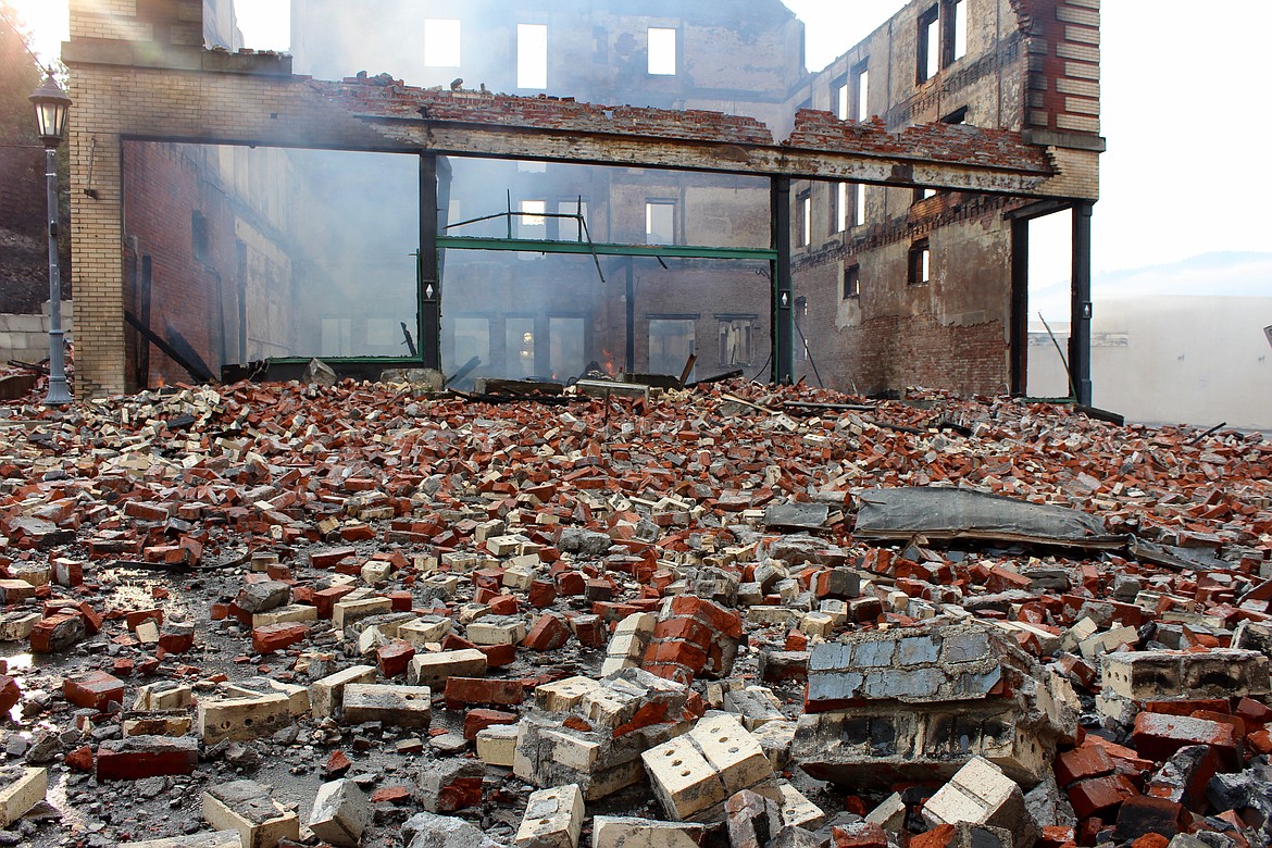 Photo by CHANSE WATSON
Debris covers Main Street as a result of the front wall collapse.