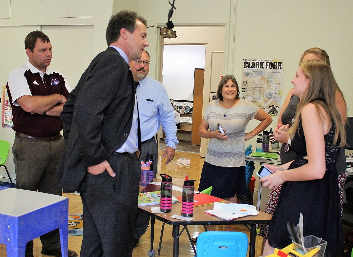 Montana Gov. Steve Bullock visits with Alberton student reporter Emmah Baughman last Tuesday about the STARS Preschool Grant awarded to the school. Also pictured is Alberton School Principal Kyle Fisher (left), Superintendent Steve Picard, and Linda Gardner (right). (Kathleen Woodford/Mineral Independent)