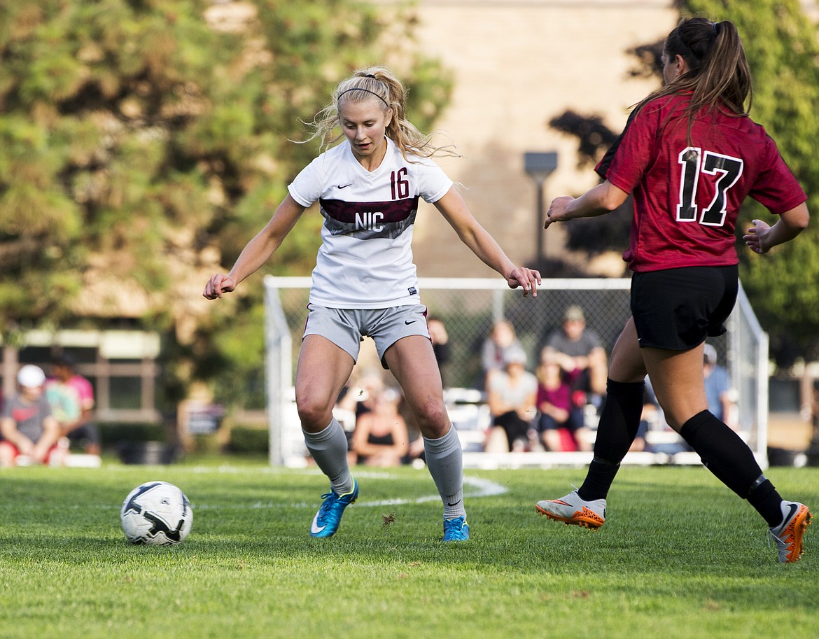 LOREN BENOIT/Press
North Idaho College midfielder Ellory Ferris creates space between the ball and Yakima Valley&#146;s Courtney Abrams. NIC won 1-0.