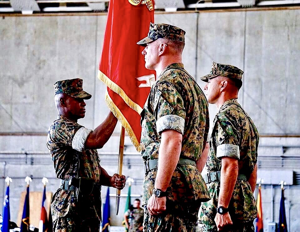 Sgt. Maj. Jerry Taylor conducting the passing of the command&#146;s colors from the outgoing commander to Col. Coppess.