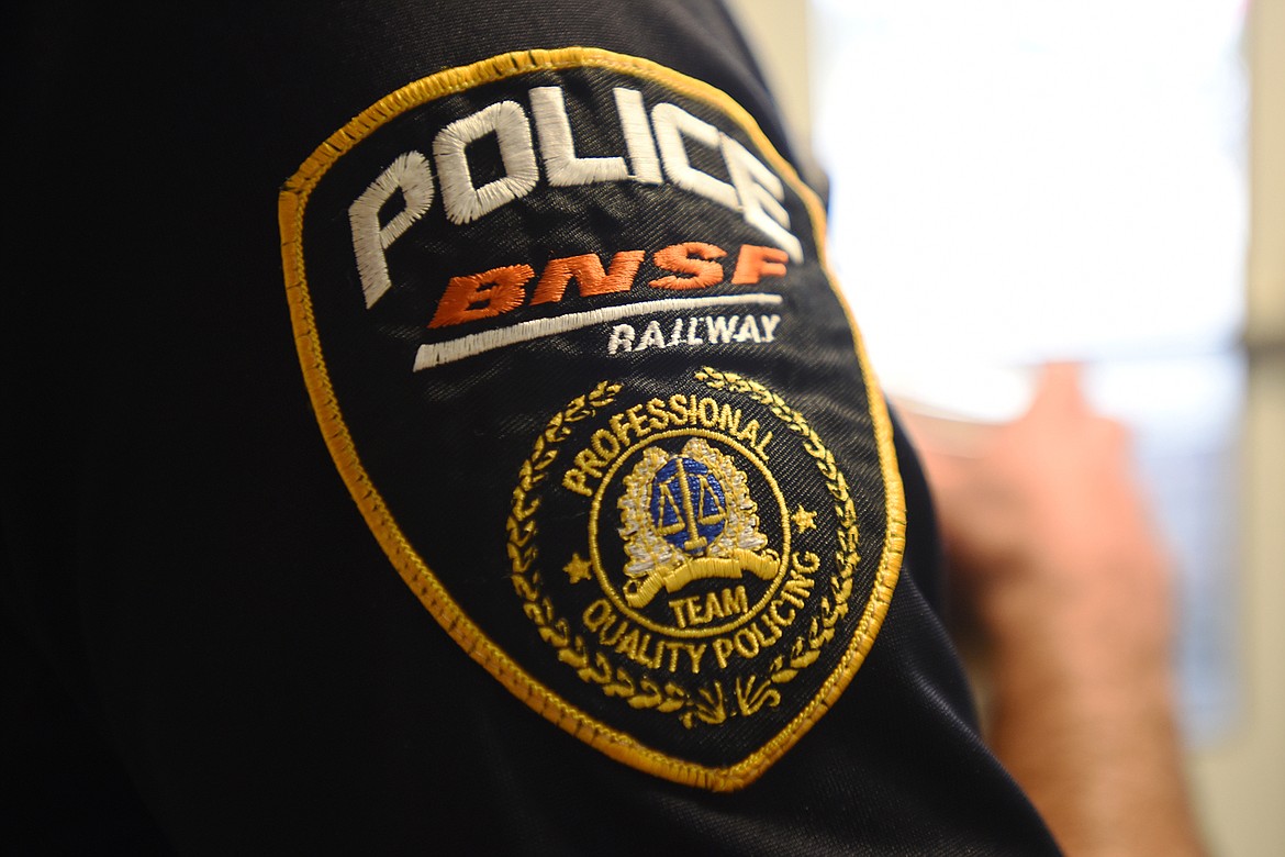 Detail of a badge of a Sr. Special Agent with the BNSF Police Officer standing watch at the Columbia Falls Junior High on Tuesday, September 19. Many members of the law enforcement community have stepped up to have their presence seen and felt at schools around the Flathead Valley. In addition to the police departments and Sheriff&#146;s Office school security was bumped up by officers from BNSF, the Border Patrol, Fish and Game and Montana Highway Patrol and the National Forest Service.
(Brenda Ahearn/Daily Inter Lake)