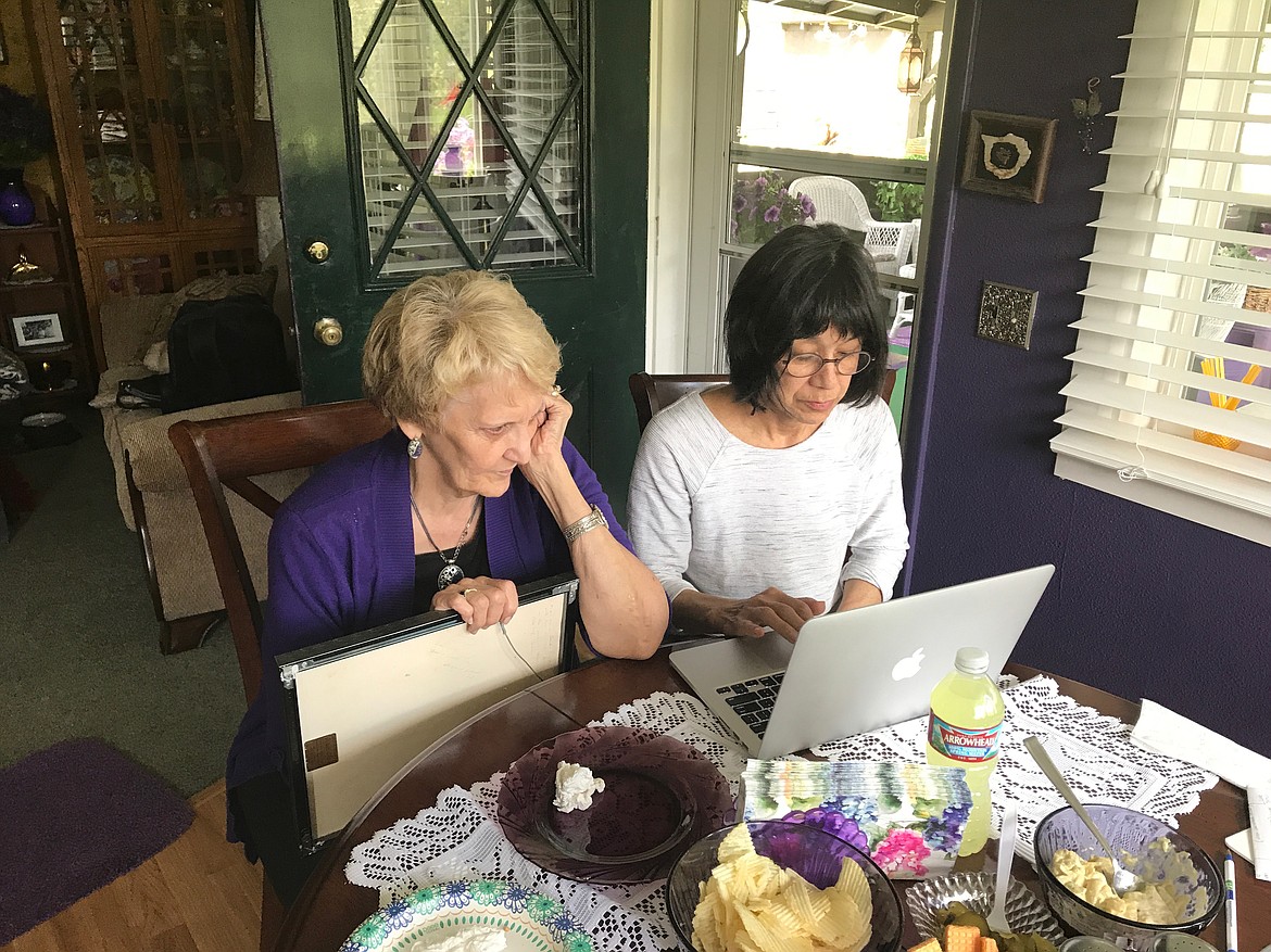 Kathryn Tolbert, an editor at The Washinton Post and the daughter of a Japanese war bride, interviews Marianne Roose of Fortine for the war brides oral history project. Roose is the sister of Dale Burk, who brought his Japanese bride to live in the Trego area.