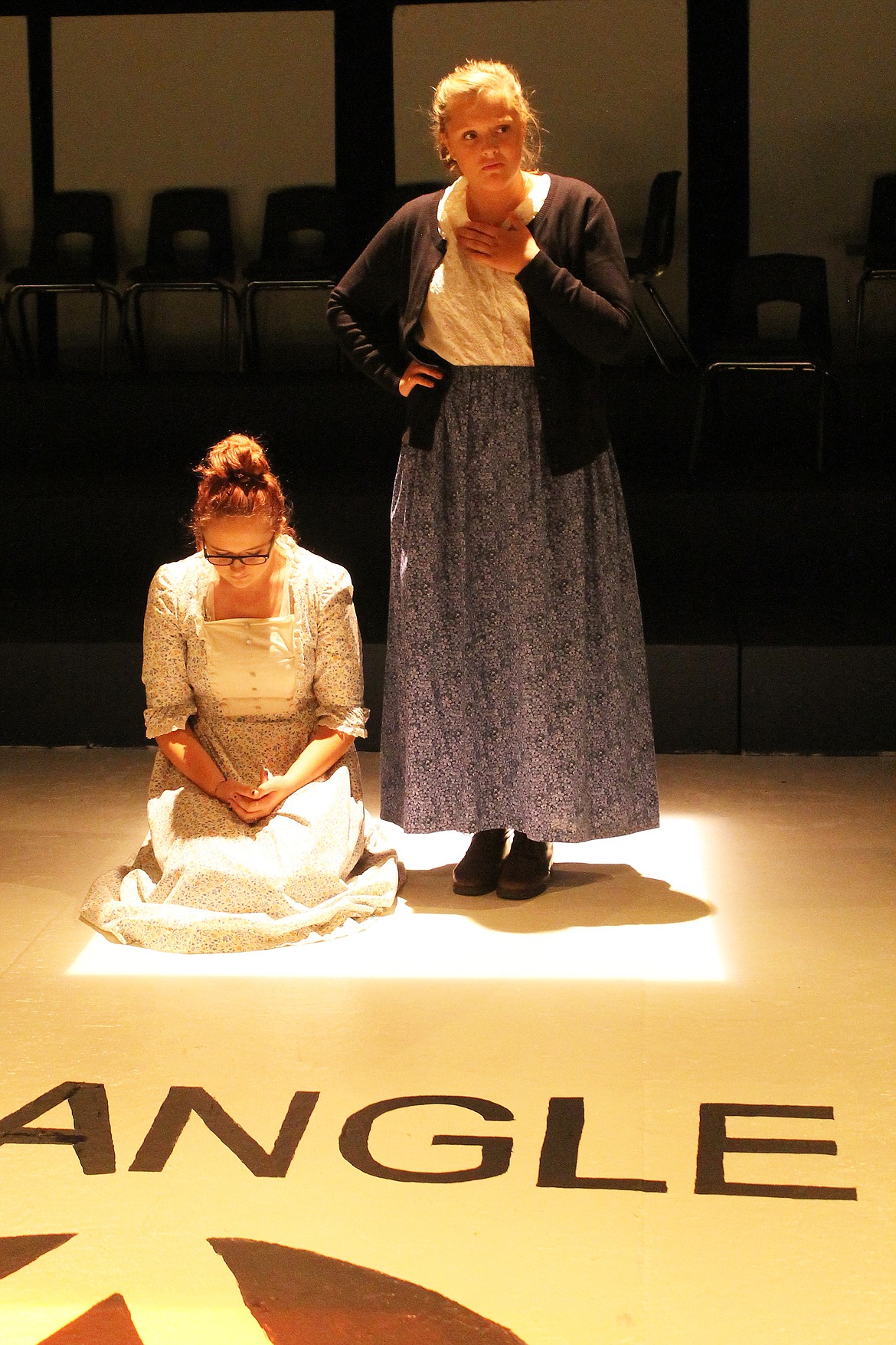 Kenzie White as Mary Alter, a secretary, and Jez Schussler as Dinah Lifschitz, a bookkeeper, at the Triangle Factory on March 25, 1911. (Courtesy photo)