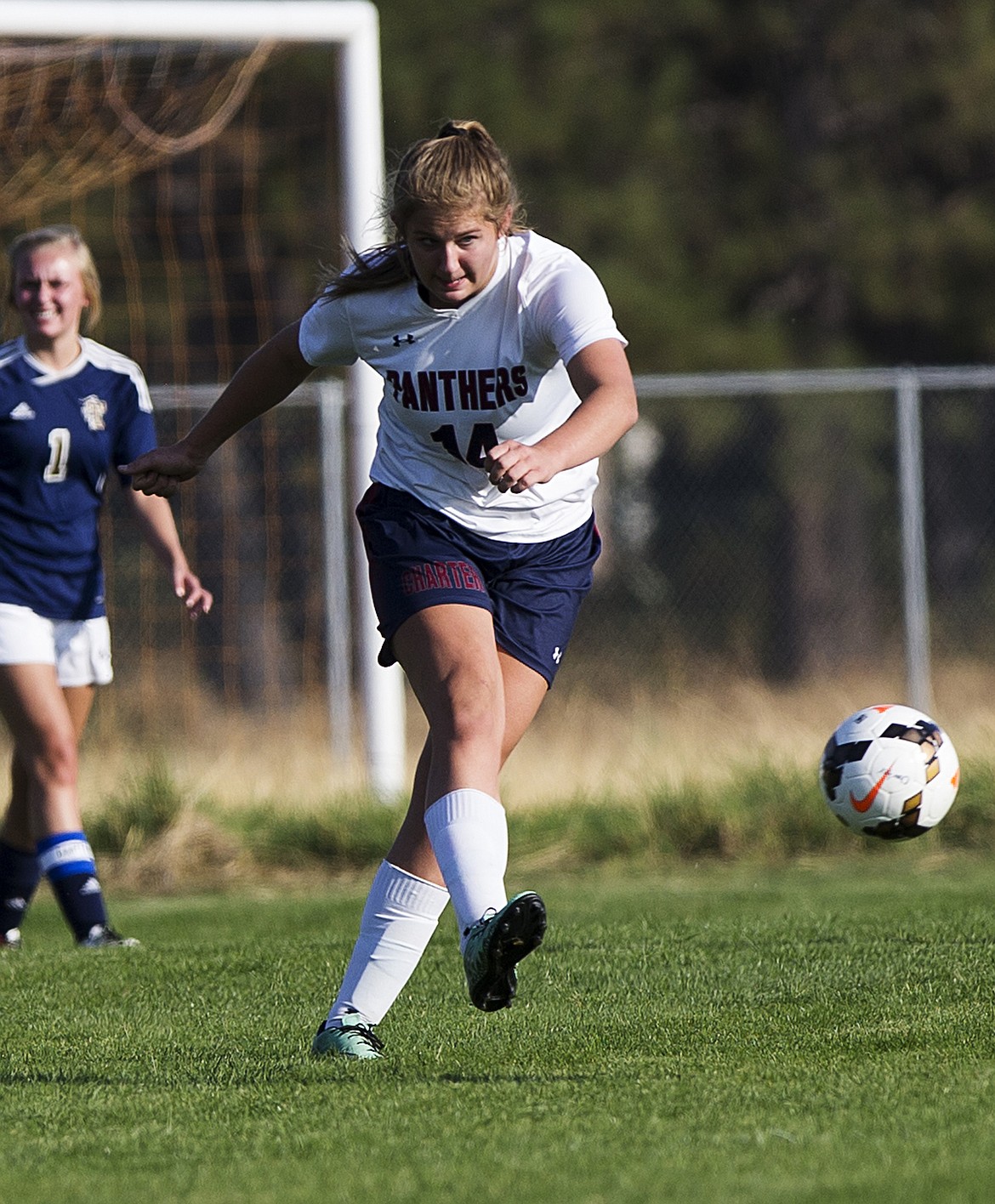 LOREN BENOIT/Press

Sandi Faulkner of Coeur d&#146;Alene Charter Academy passes the ball to a teammate during a game against Timberlake High School on Tuesday at Community United Methodist Church.