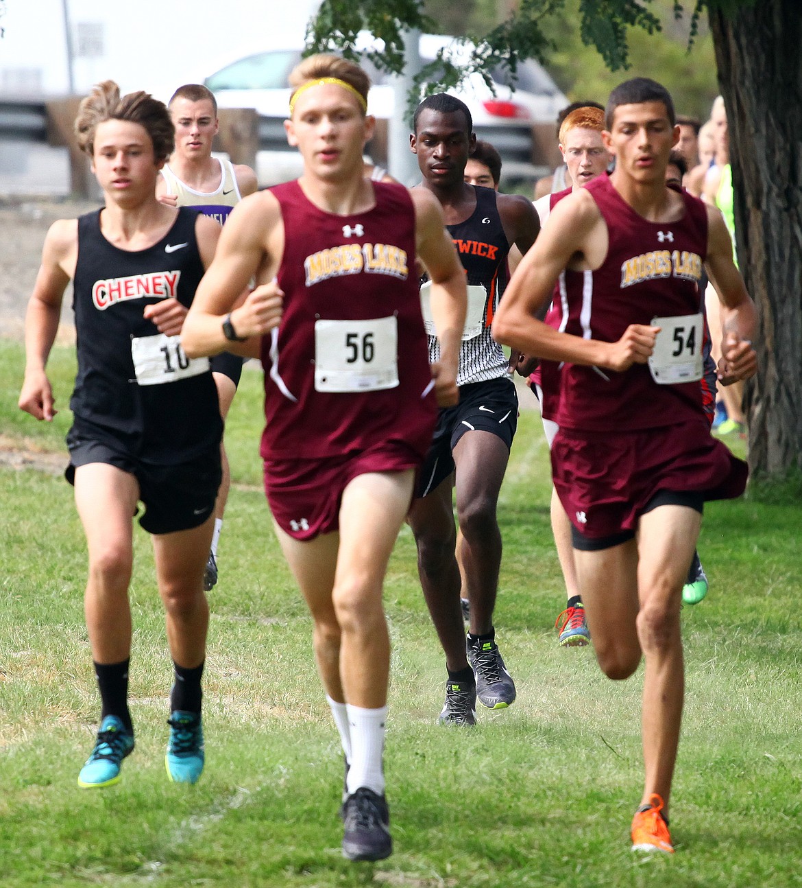 Rodney Harwood/Columbia Basin Herald
Trail of the Sabre award winner Joshua Cooper (54) was the No. 2 runner at the boys varsity race at the Moses Lake Invite.