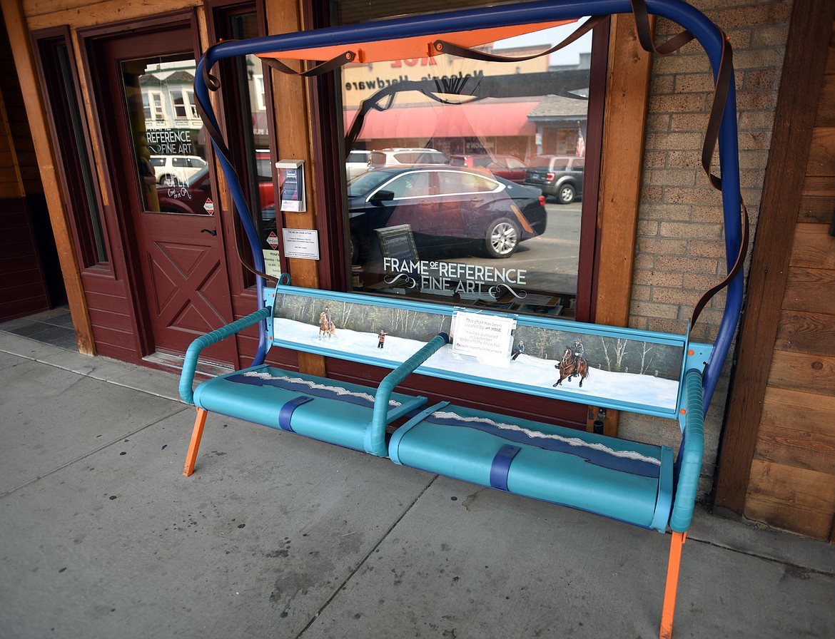 A ski lift chair donated by Whitefish Mountain Resort and redecorated by artist: Dee Dee Cooper sits outside Frame of Reference in downtown Whitefish. The chairs will be sold at the Big Ski Chair Affair Auction is September 21 at 7 p.m. at the Craggy Range Bar and Grill. The event is a fundraiser for the SNOW Bus and Glacier Park Express.
(Brenda Ahearn/Daily Inter Lake)