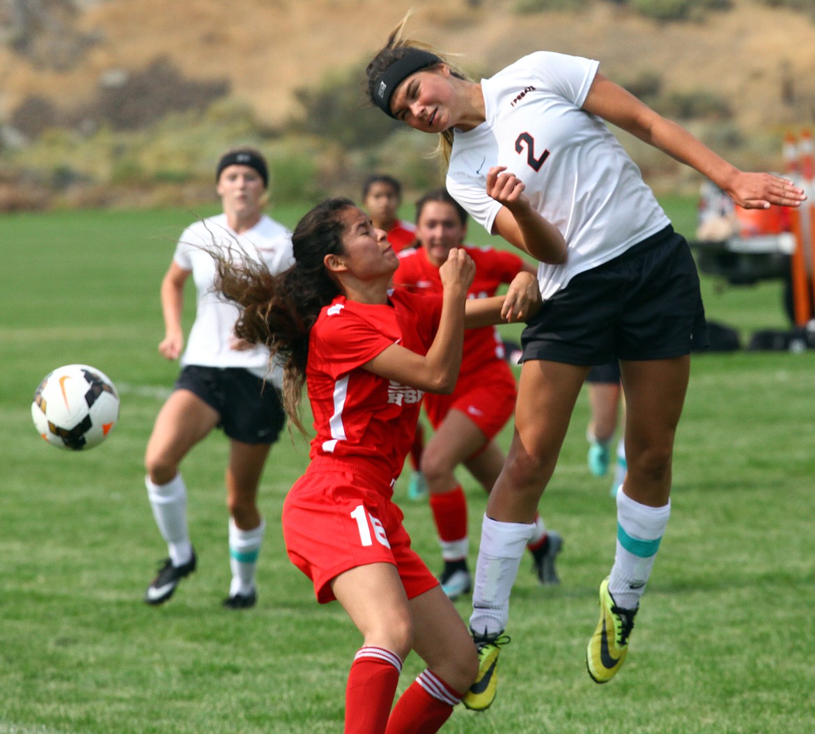 Rodney Harwood/Columbia Basin Herald
Ephrata striker Mya Spencer (2) gets a head on the ball during a corner kick in the second half of Saturday's match with Othello.