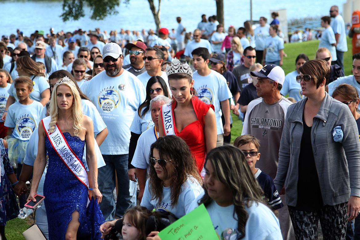 File photo
Mrs. America 2016 Natalie Luttmer of Moses Lake, center, participates in last year&#146;s Moses Lake Buddy Walk in support of people with Down Syndrome.