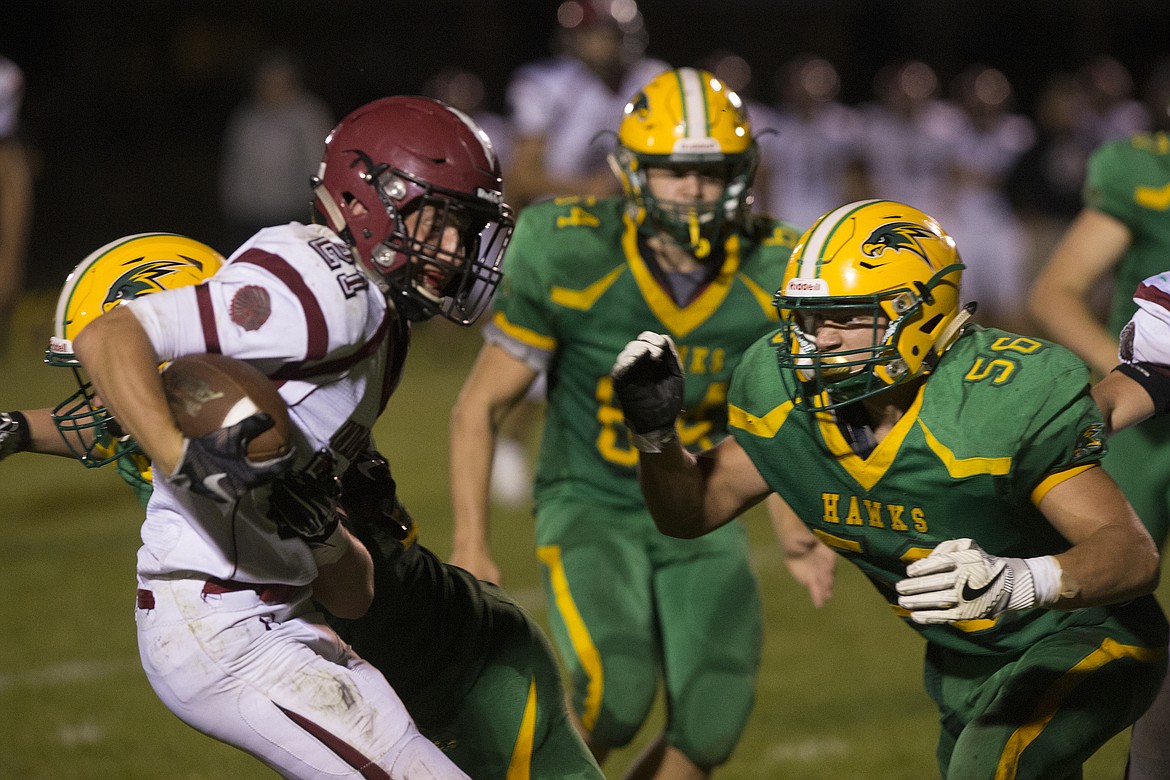 LOREN BENOIT/Press
Lakeland&#146;s Bradley Allen closes in to tackle Colville&#146;s Dawson Flugel in a game at Lakeland High School on Sept. 1.