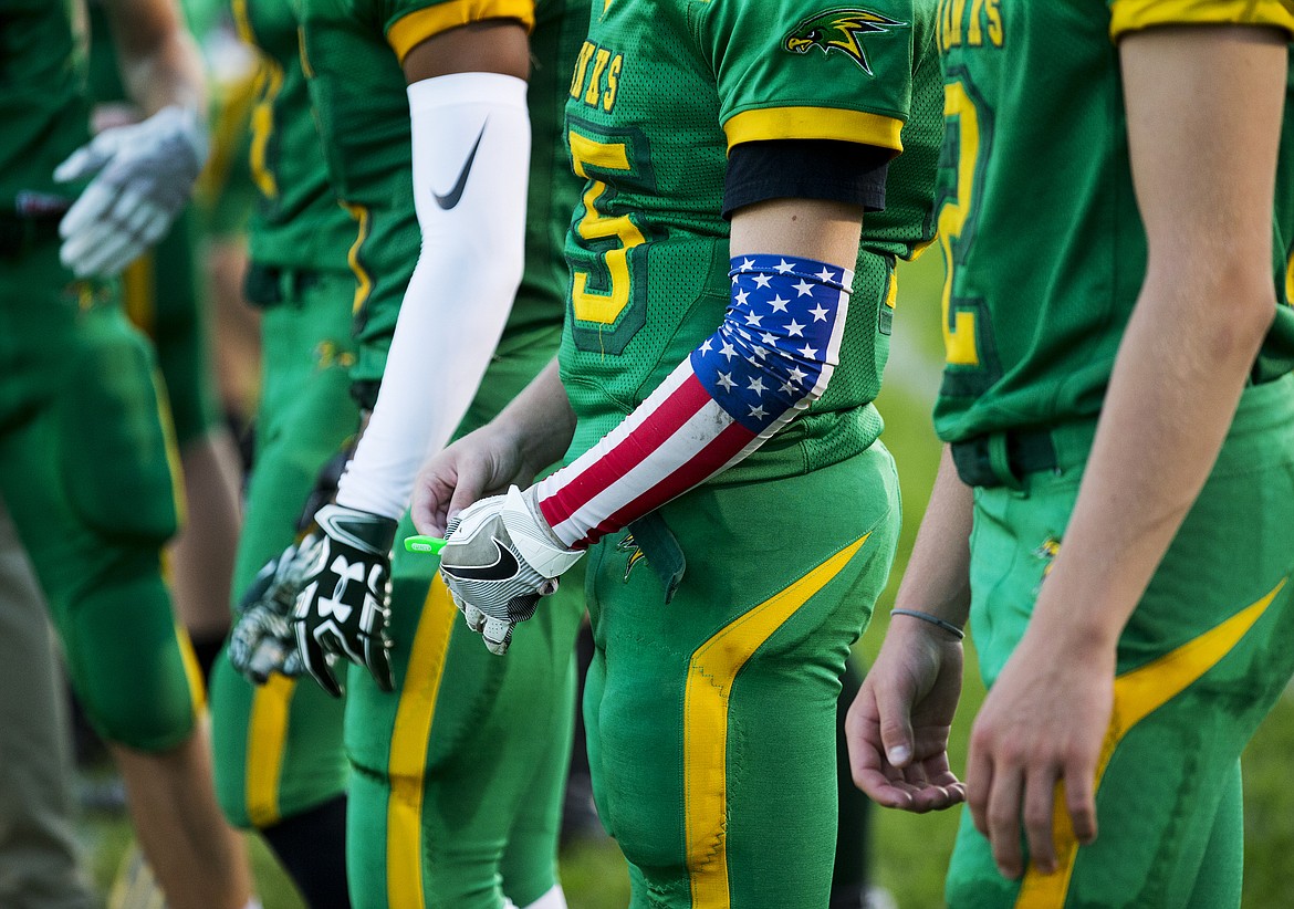 LOREN BENOIT/Press
Lakeland&#146;s Eli Asher sports a patriotic arm sleeve in a game against Colville High School on Sept. 1.