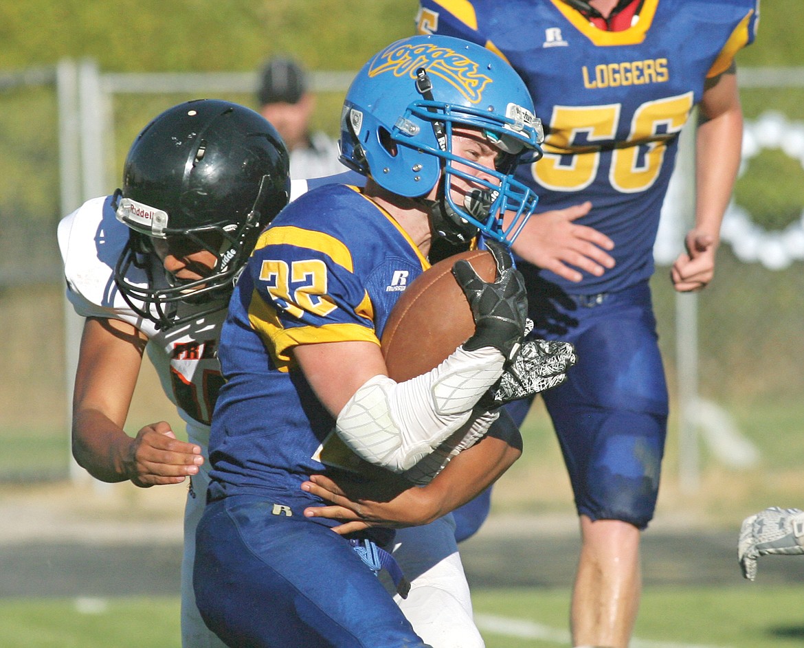 Drew Ginther charges into the end zone for a successful two point conversion in fourth quarter vs. Frenchtown Monday afternoon. (Paul Sievers/The Western News)