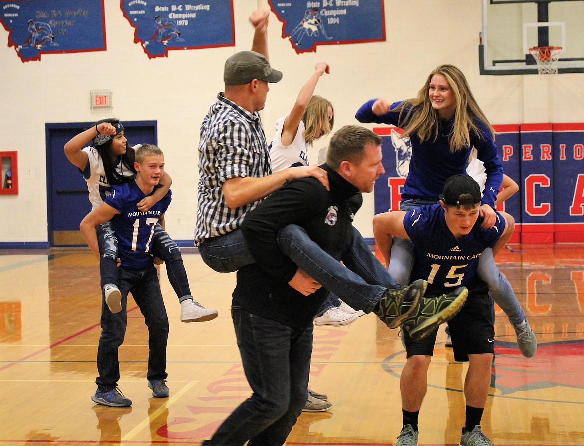 Piggy-back rides made for more Homecoming fun during Friday afternoon games. (Photo by Frankie Kelly)
