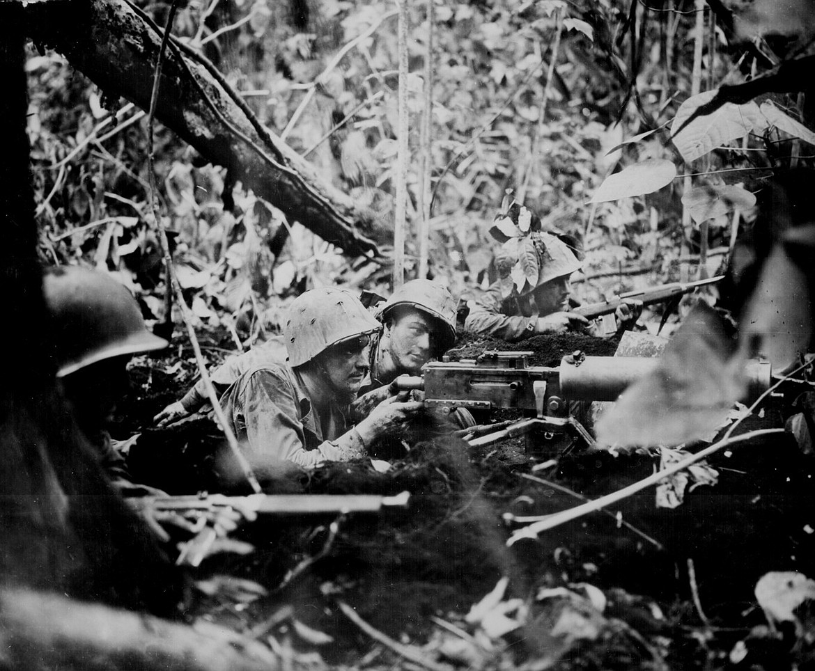 NATIONAL ARCHIVES
Nathan K. Van Noy Jr. fired his machine gun until the last bullet at Japanese invaders at Finschafen, New Guinea, in 1943 before losing his life.