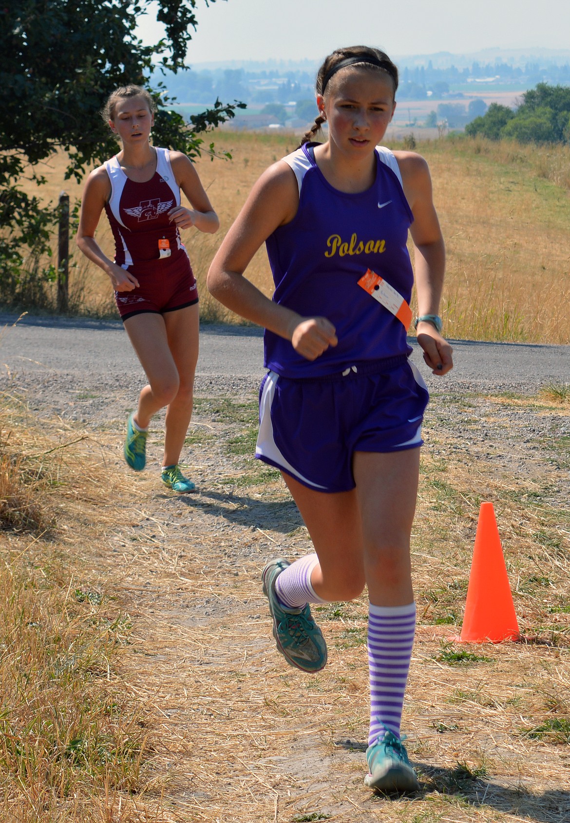 POLSON RUNNER Gwen Seeley competes in the Ronan Invitational in Pablo. (Jason Blasco/Lake County Leader)