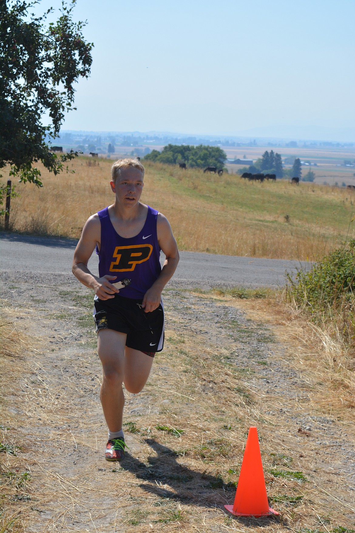 POLSON RUNNER Zachary Evertz runs in the Ronan Invitational in Pablo. (Jason Blasco/Lake County Leader)