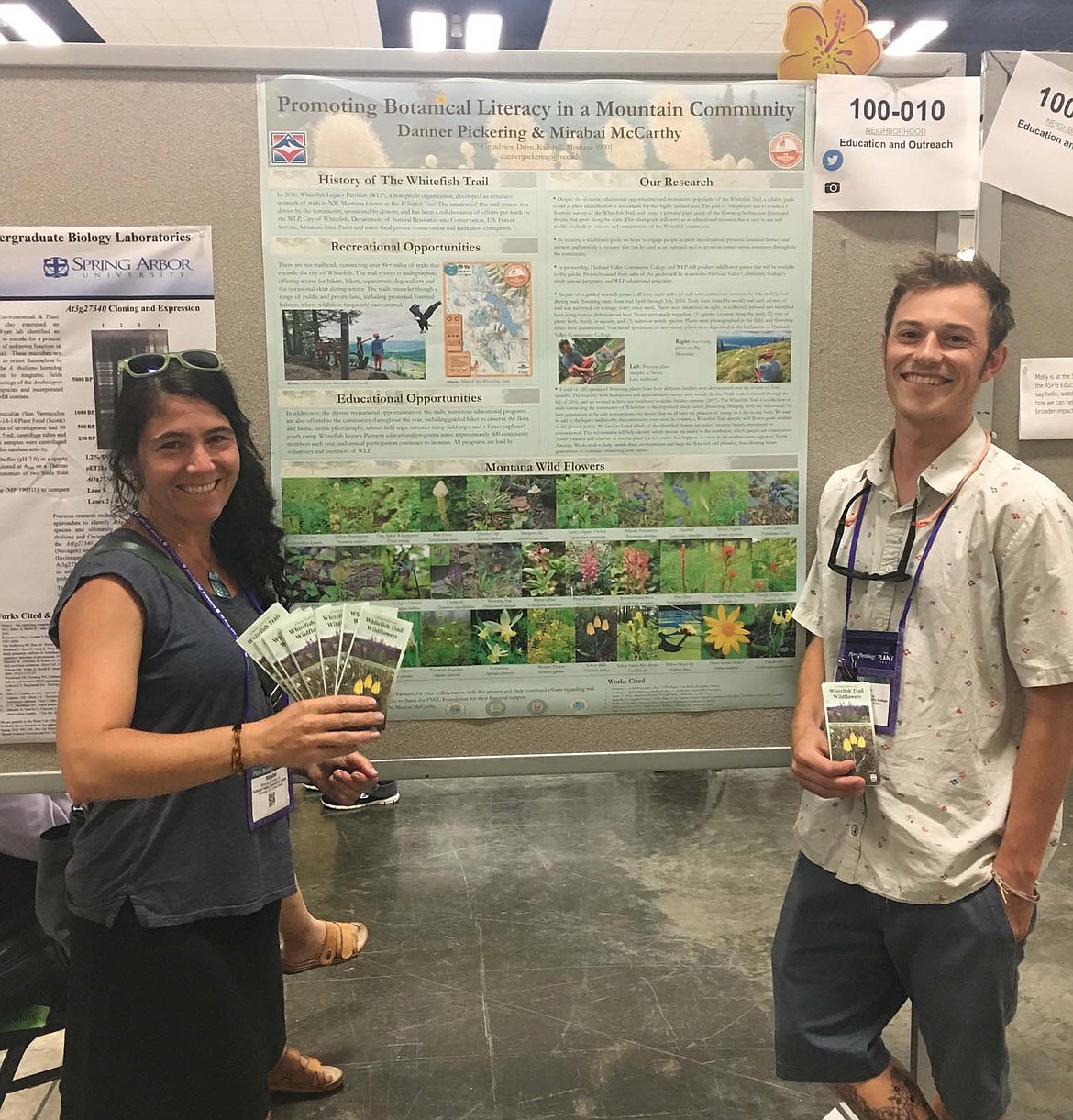 Flathead Valley Community College professor Mirabai McCarthy and student Danner Pickering in front of a poster on the guide at the American Society of Plant Taxonomy conference in Hawaii.