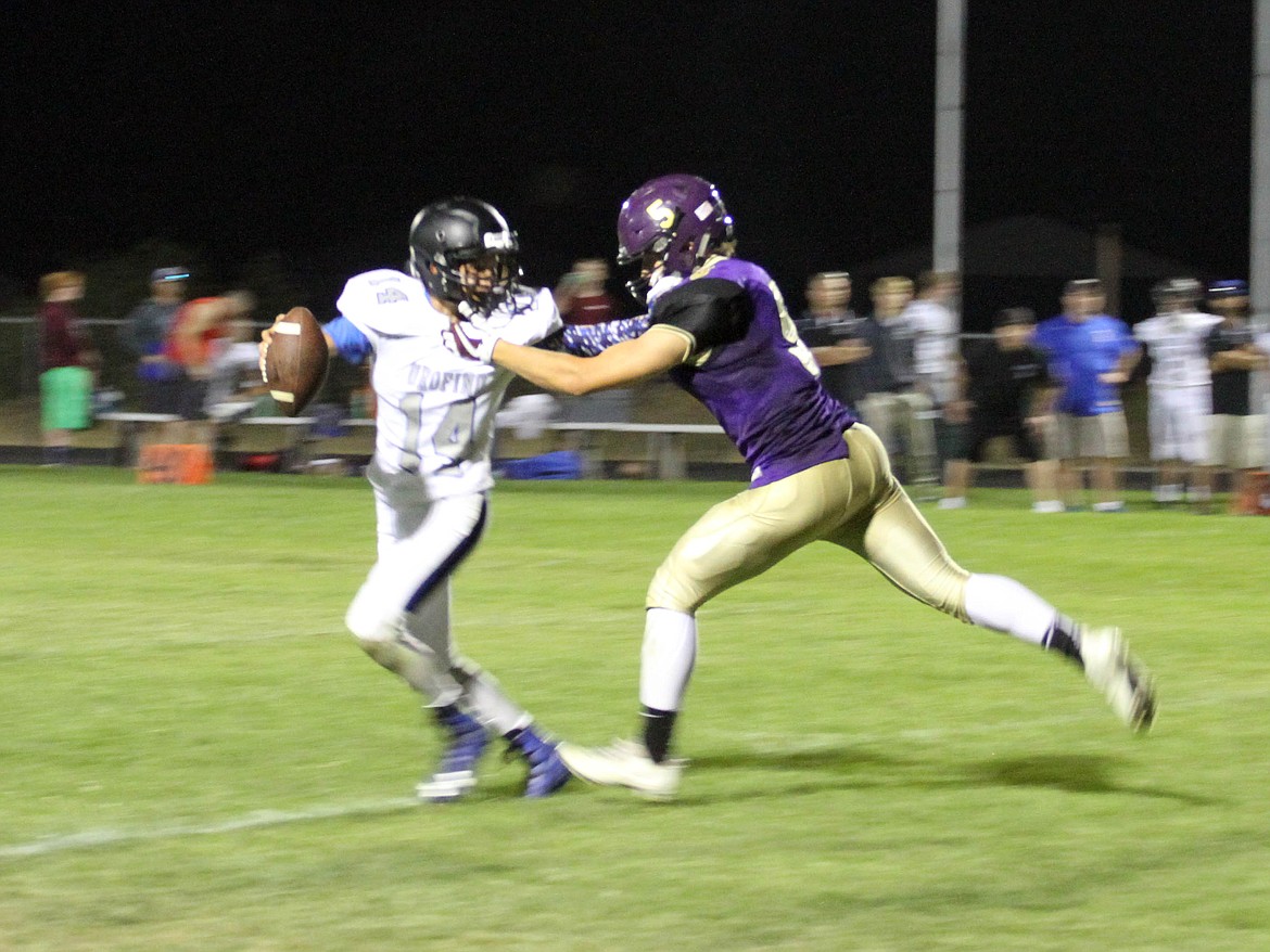 Chase Jerome terrorizes the Orofino quarterback during the fourth quarter of Kellogg's win over the Maniacs.