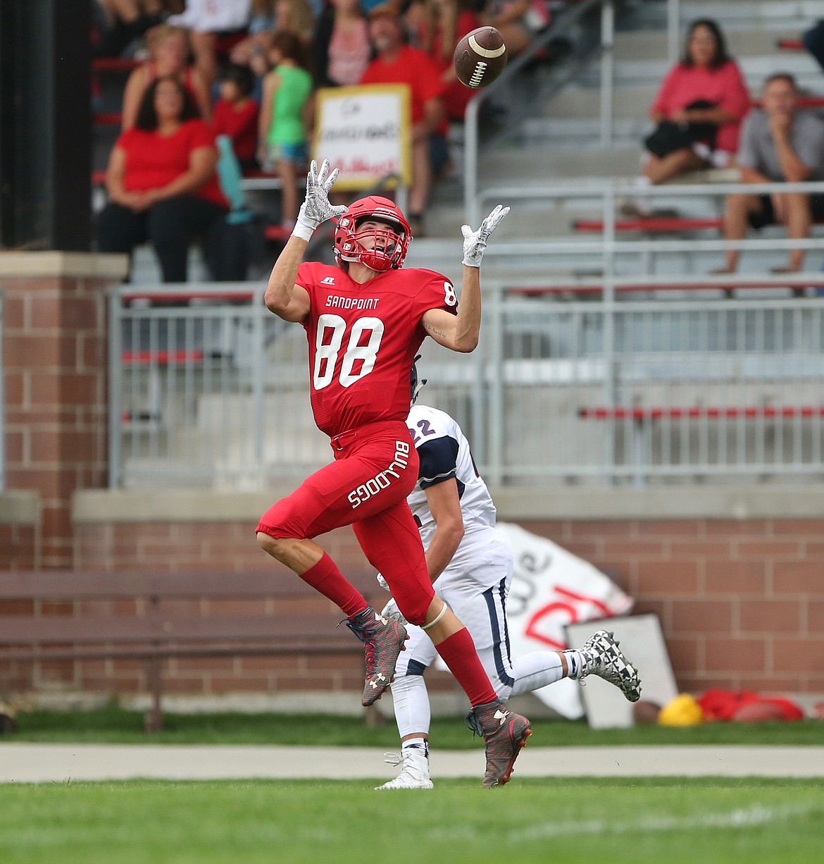 (Photo by JASON DUCHOW PHOTOGRAPHY)
Sandpoint senior receiver T.J. Davis hauls in one of the two passes he caught from Declan Plummer for 72 yards in defeat.