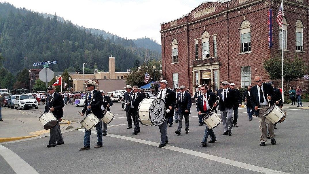 Photos by Sera White/ 
The Wallace Elks Drum and Bugle Corps march down Front Street during the Elks Roundup event.
