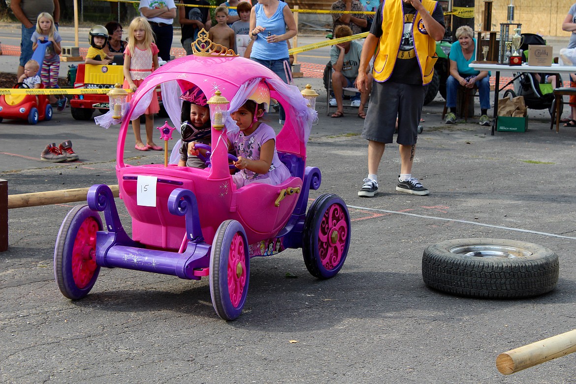 Who says princesses aren&#146;t tough? Kiddos swerve through tires and traverse the kids powerwheels obstacle course. 
These young ladies took first place in the event.