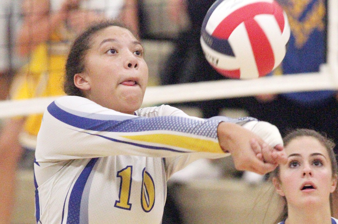 Junior Mehki Sykes passing in third game vs. Polson Saturday. Lady Loggers over Lady Pirates in three: 25-12, 25-17, 25-17. (Paul Sievers/The Western News)