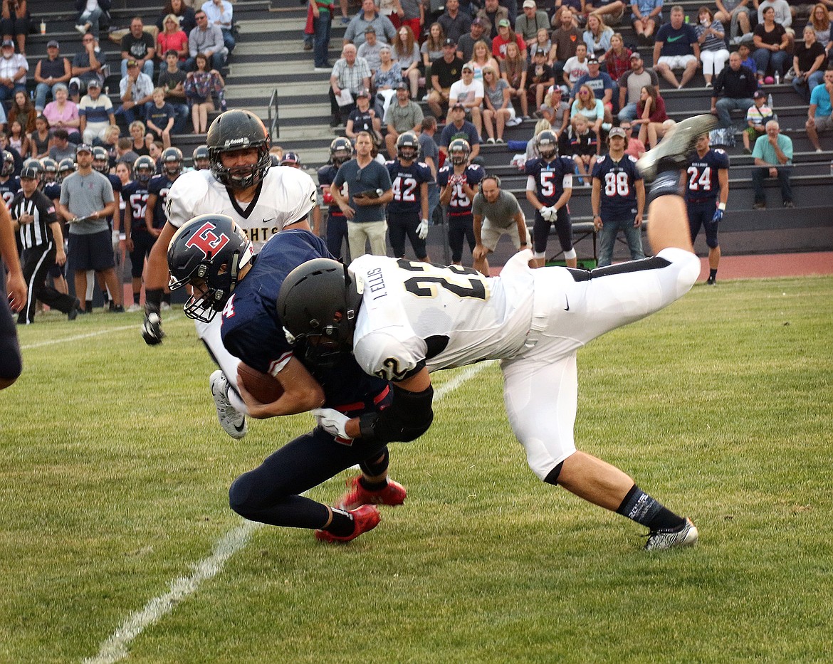 Pete Christensen/courtesy photo - Isaac Ellis sacks the Bulldogs quarterback. Royal&#146;s defense came up big all night, holding Ellensburg to 125 total yards and four first downs.