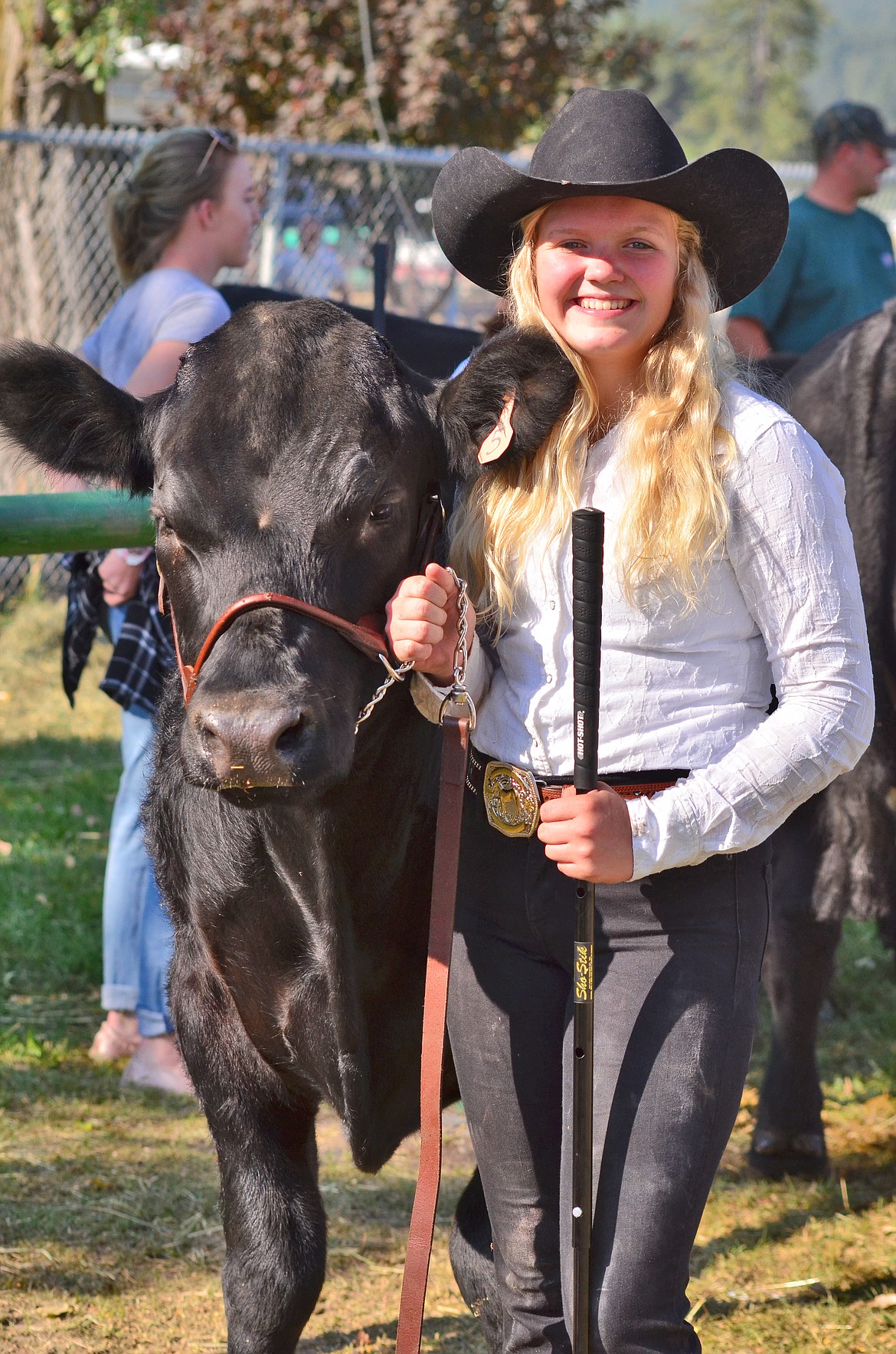 Faith Frields from the Whitepine Happy Workers 4H club getting ready to show her steer Ferdinand. (Erin Jusseaume/ Clark Fork Valley Press)