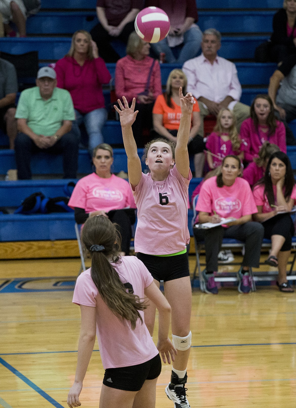 LOREN BENOIT/Press

Coeur d&#146;Alene&#146;s Lauren Phillips sets the ball to a teammate during Volleyball for the Cure Thursday night at Coeur d&#146;Alene High School.