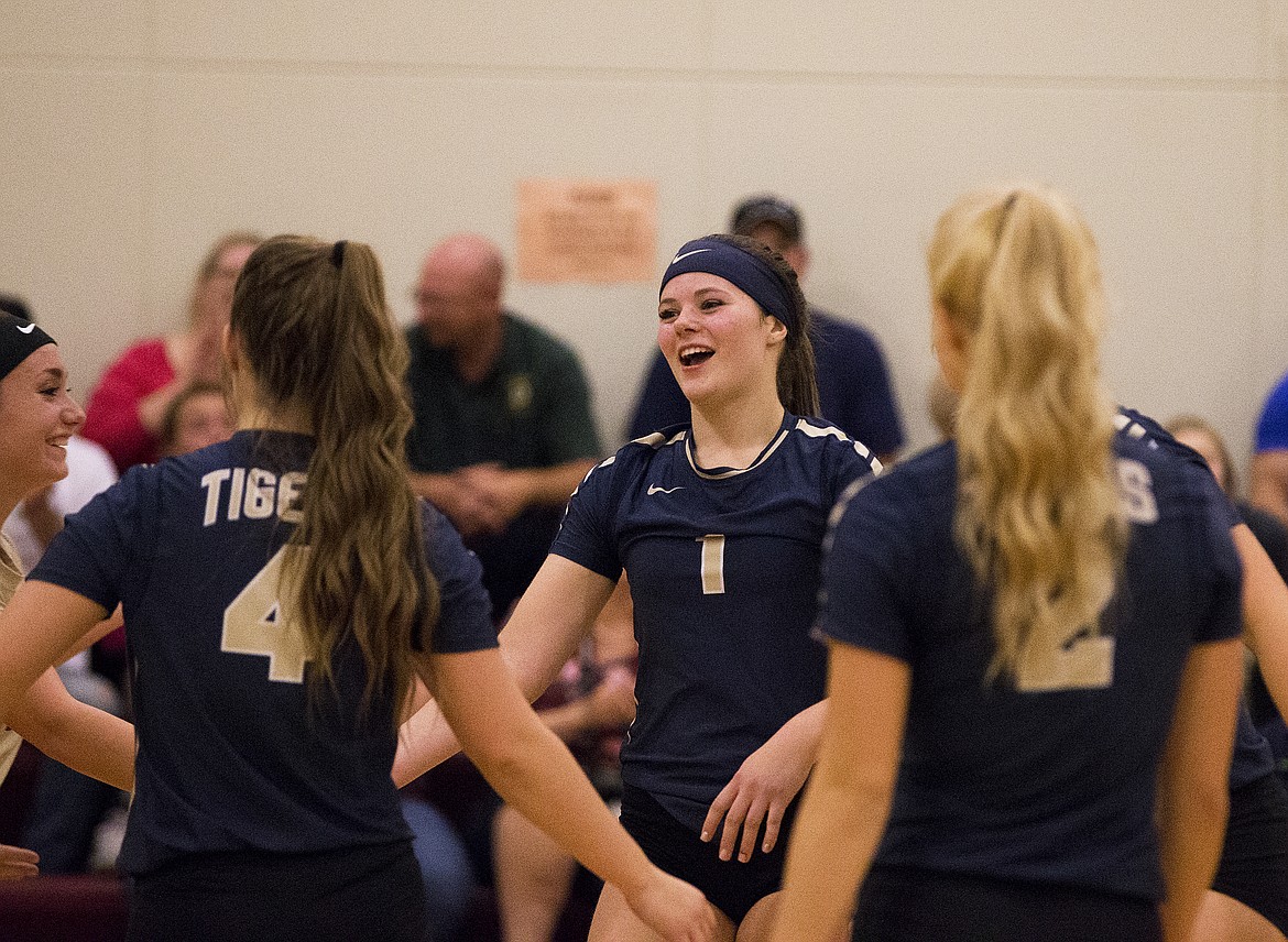 LOREN BENOIT/Press

Timberlake&#146;s Kyndal Lindley celebrates a point with her teammates during a match against Coeur d&#146;Alene Charter Academy.