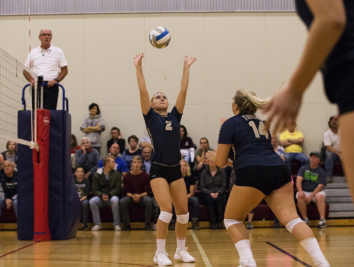 LOREN BENOIT/Press
Timberlake junior McKeeley Tonklin sets the ball to Caitlin Garwood (14) in a match against Coeur d&#146;Alene Charter Academy on Tuesday at Holy Family Catholic School.