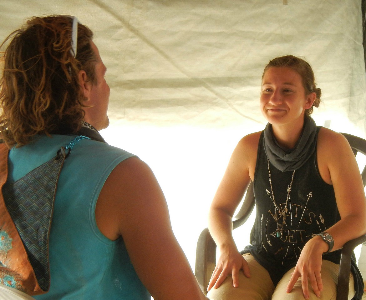 Courtesy photo



Abby Owens, right, visits with a woman during Burning Man 2017. Owens is part of a group that sets up a coffee dome and encounter tent where Burners can seek respite and spiritual healing during the frenzy and fun of Burning Man.