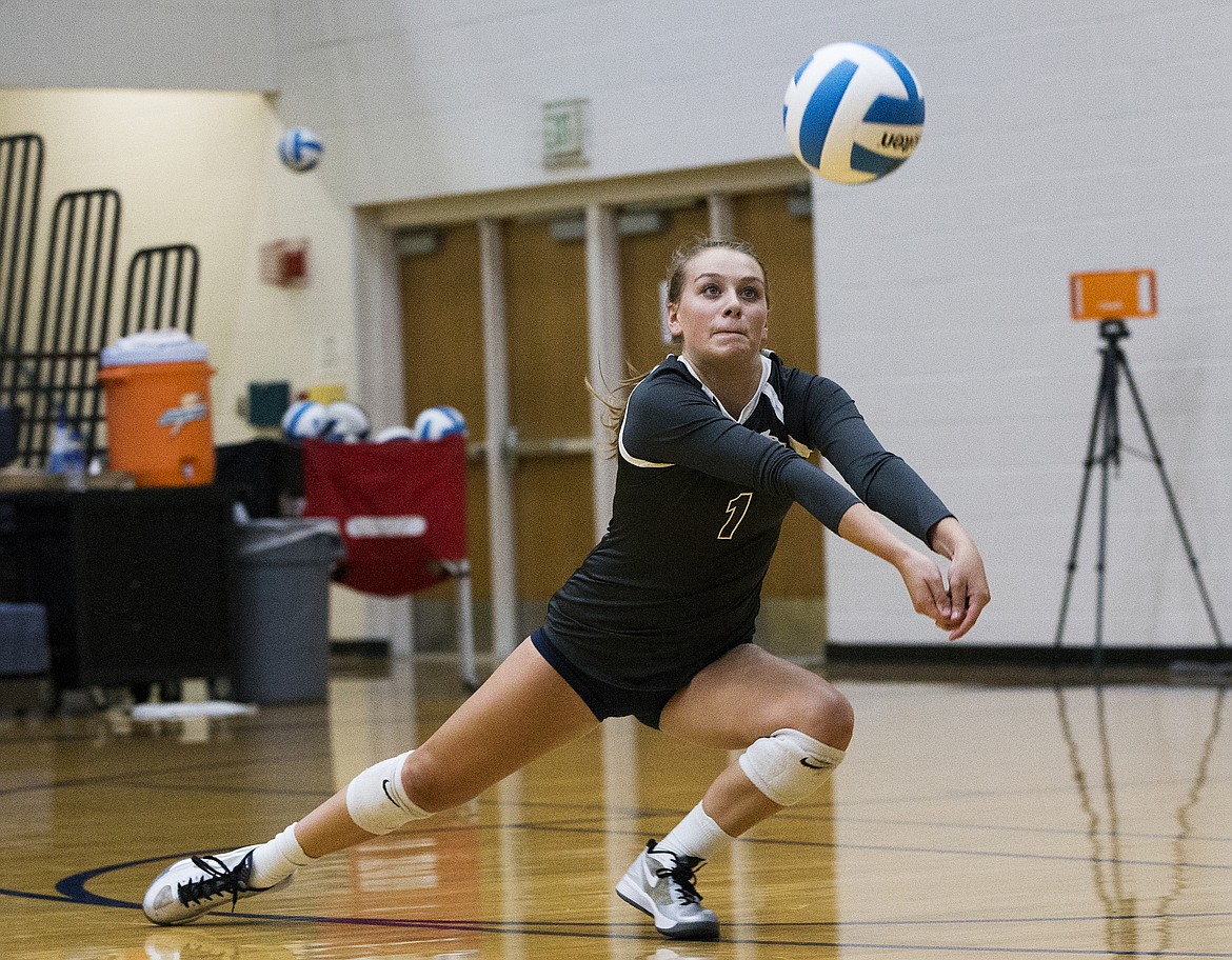 LOREN BENOIT/Press
Lake City&#146;s Ashley Reyes dives for the ball during a match against Lakeland last Tuesday at Lake City High School.