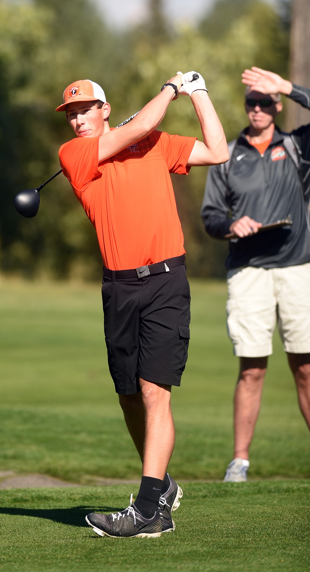 Flathead senior Sam Elliott tees of during the AA State Tournament at Buffalo Hills Golf Course in Kalispell on Tuesday, September 26.(Brenda Ahearn/Daily Inter Lake)